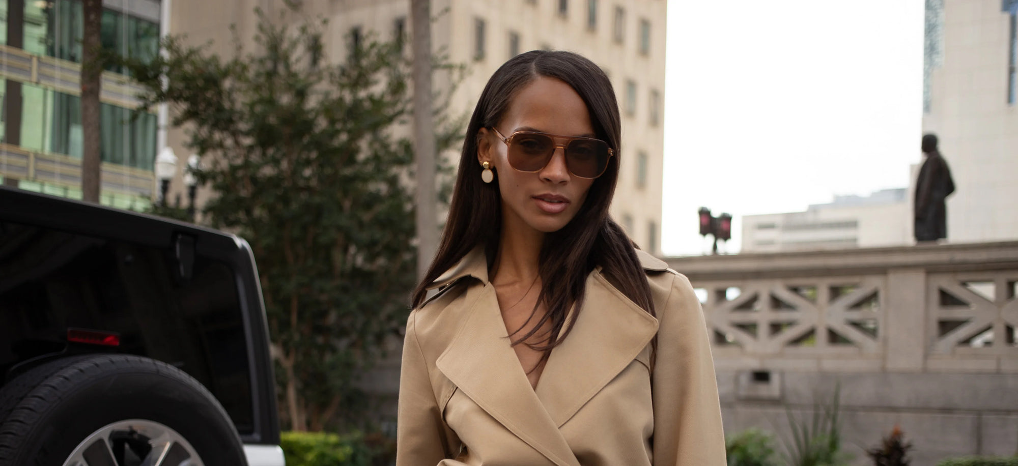 Woman in a beige trench coat Contact Us Today to Purchase