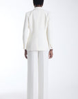 Agus cropped blazer in ecru worn with matching wide leg trousers, back view on model.