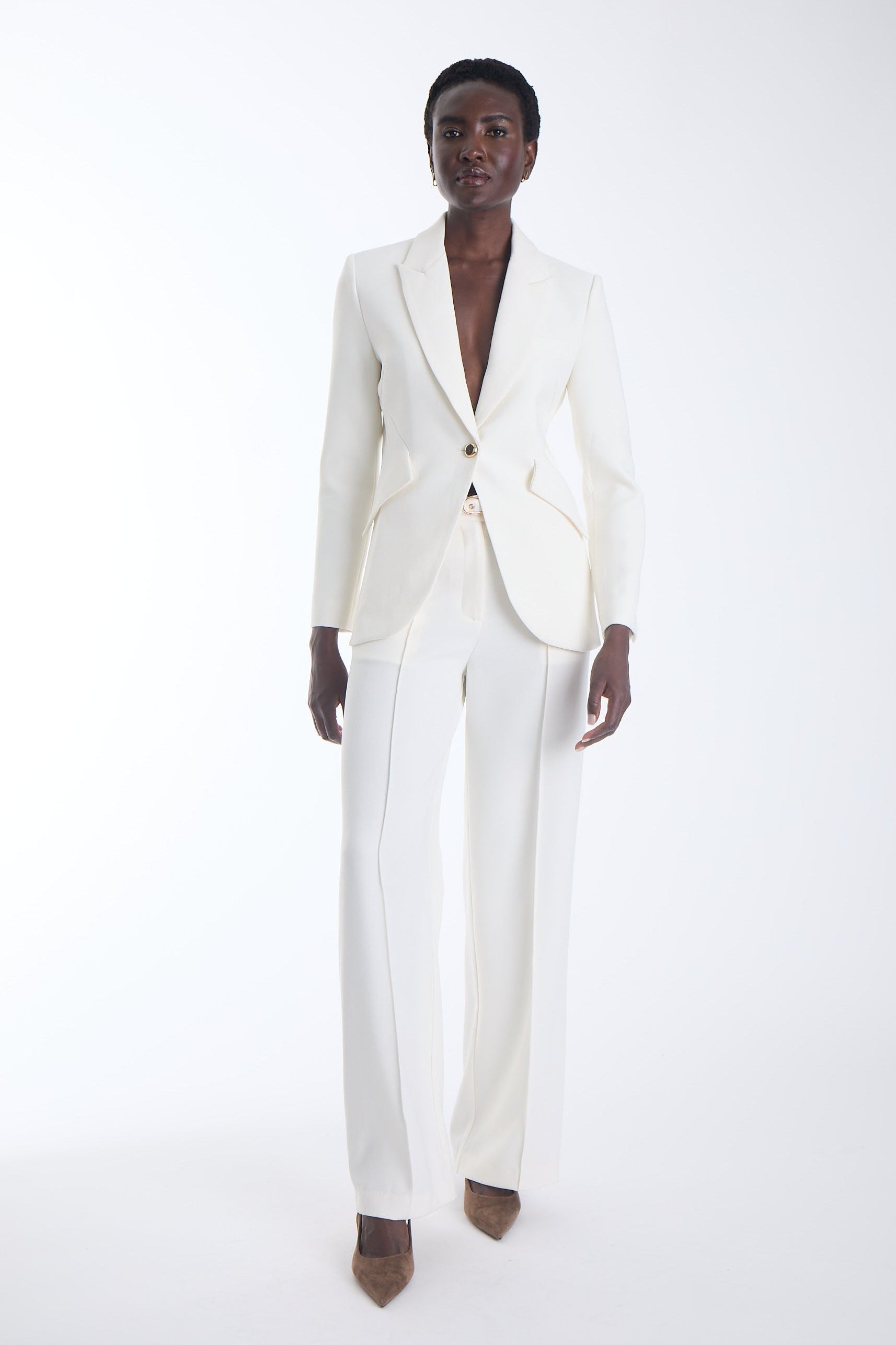 Agus cropped blazer in ecru with a notched lapel, worn with matching wide leg trousers, front view on model.