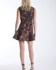 Sain print mini dress in tortoise shell, back view on model.