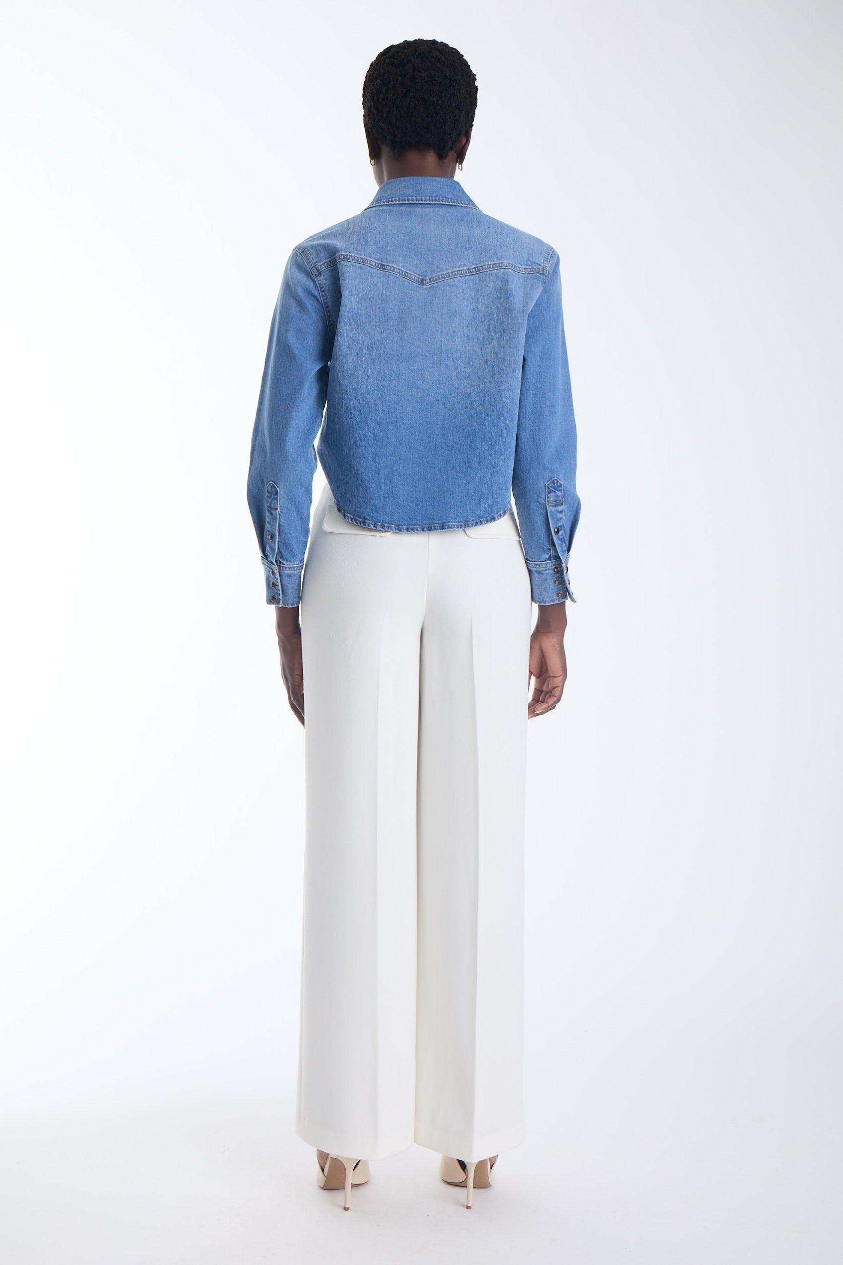 Alex high waisted wide leg trousers in ecru, back view on model.