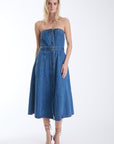 Mica strapless denim midi dress with antique gold buttons and a belted waist, front view on model.