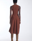 Ariene knit midi dress in copper cedar, back view on model with tan knee high boots.