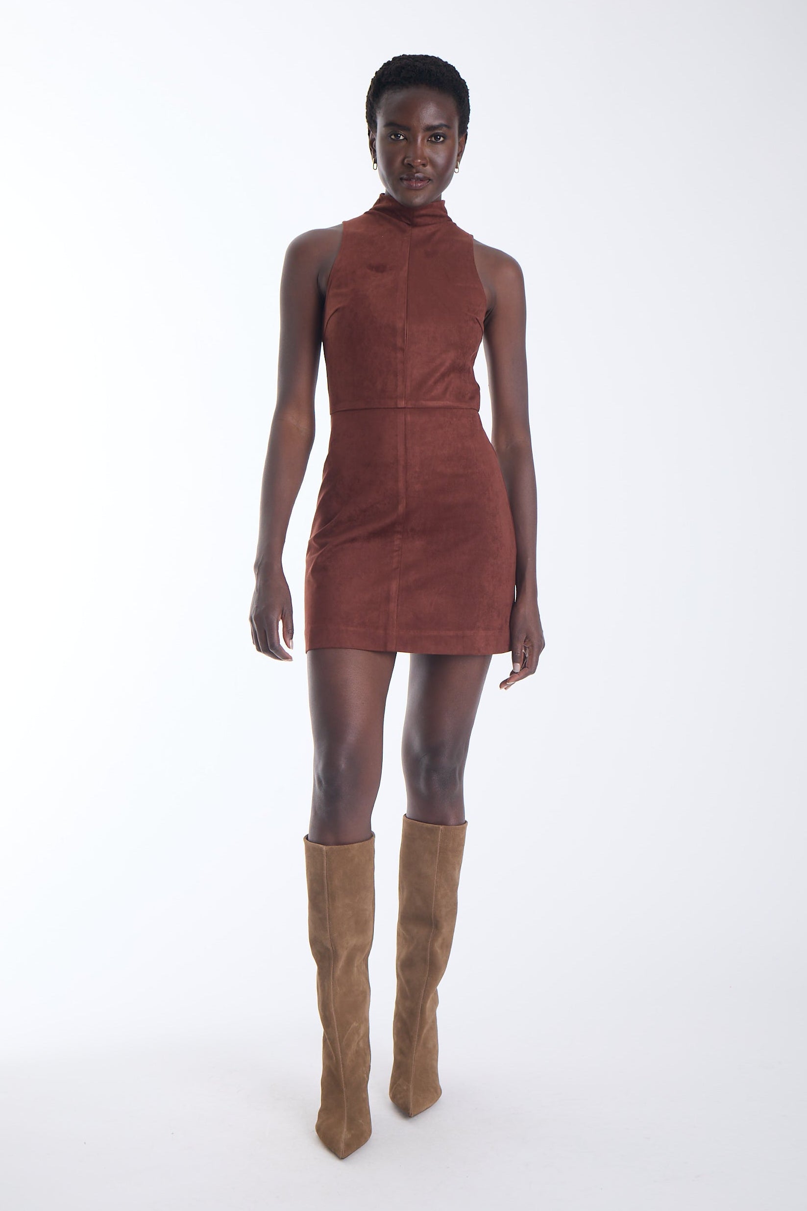 Kai vegan suede mini dress in copper cedar with a mock neck and panelled seaming, front view on model.