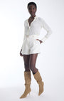 Agus high waisted tailored shorts in ecru with a slim studded belt and gold O ring, front view on model.