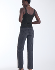 Karina Grimaldi Bowie Embellished Knit Tank in black, back view on model, scoop back with allover gold studs