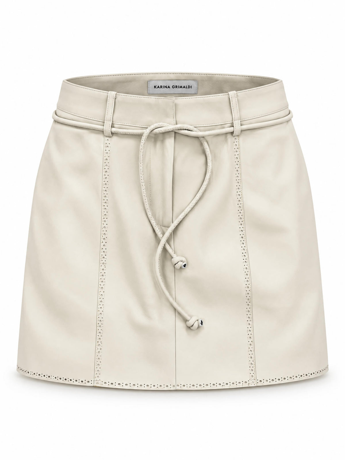 Karina Grimaldi Brair Vegan Leather Skirt in stone, front view, mini length with a self tie belt and punched trim at the hem and seams