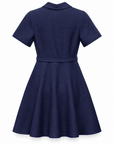 Karina Grimaldi Elsa Knit Mini Dress in navy, back view, collar and short sleeves with the belt across the back and a flared skirt.