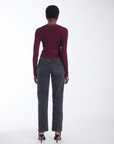Karina Grimaldi Freya Knit Wrap Top in carbernet, back view on model, ribbed with a high neck and long sleeves