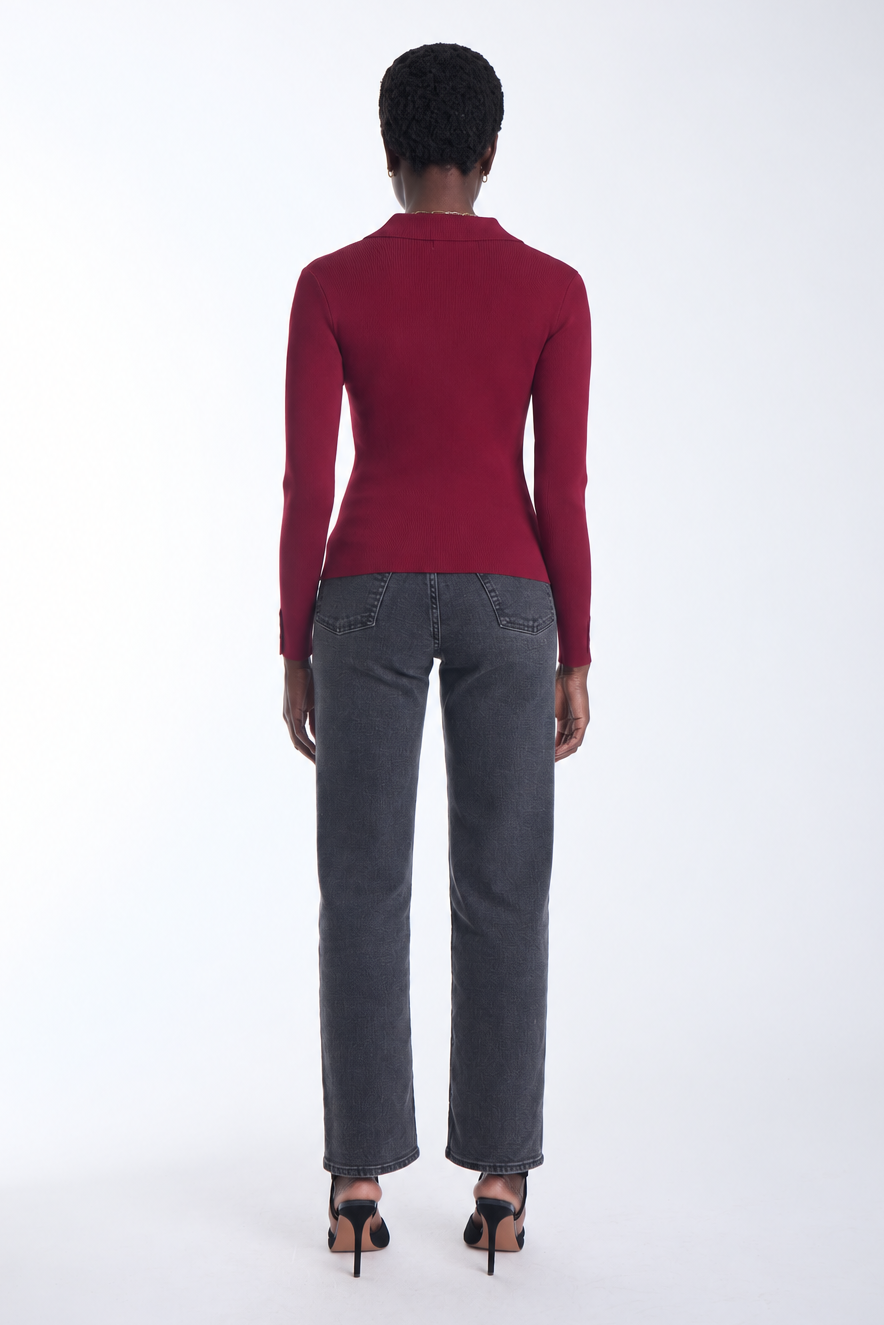 Karina Grimaldi Nova Knit Shirt in mulberry, back view on model, plain back with long sleeves, worn with jeans