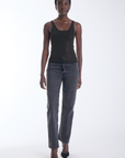Karina Grimaldi Bowie Embellished Knit Tank in black, front view on model, scoop neck with allover gold studs, worn with jeans