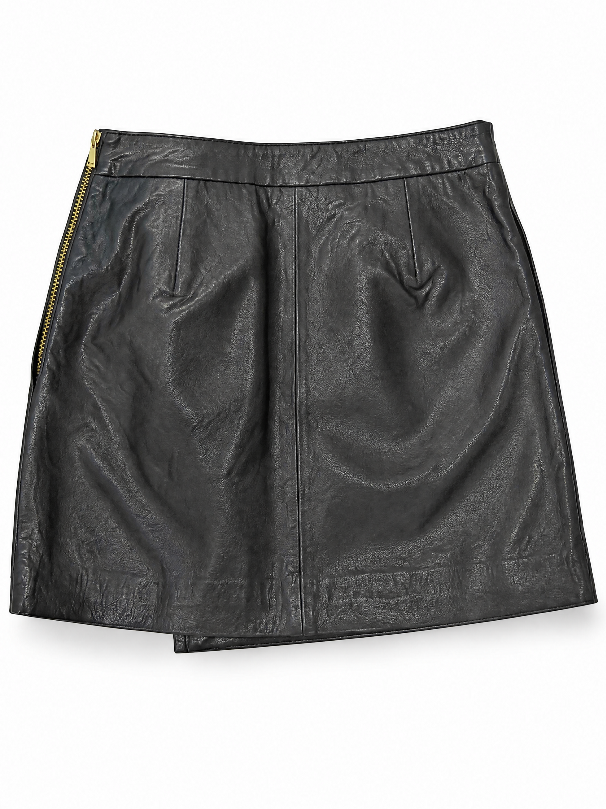 Pauli lambskin leather mini skirt in black showing the asymmetric wrap and side pocket, back view.