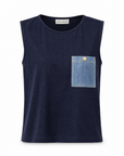 Onyx knit top in navy showing the single contrast denim chest pocket with a gold button, front view.