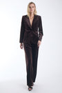 Karina Grimaldi Shon Velvet Jacket in chocolate brown, front view on model, peak lapel and a single button, worn with the matching velvet pants