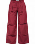 Karina Grimaldi Thea Pants in mulberry satin, front view, high waisted and wide leg with belt loops and a front pleat
