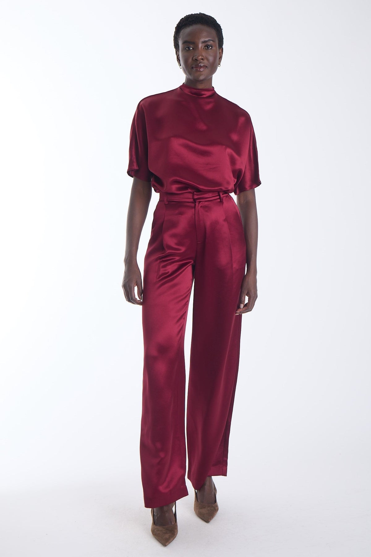 Karina Grimaldi Thea Pants in mulberry, front view on model, satin, high waisted and wide leg, worn with the Thea Blouse